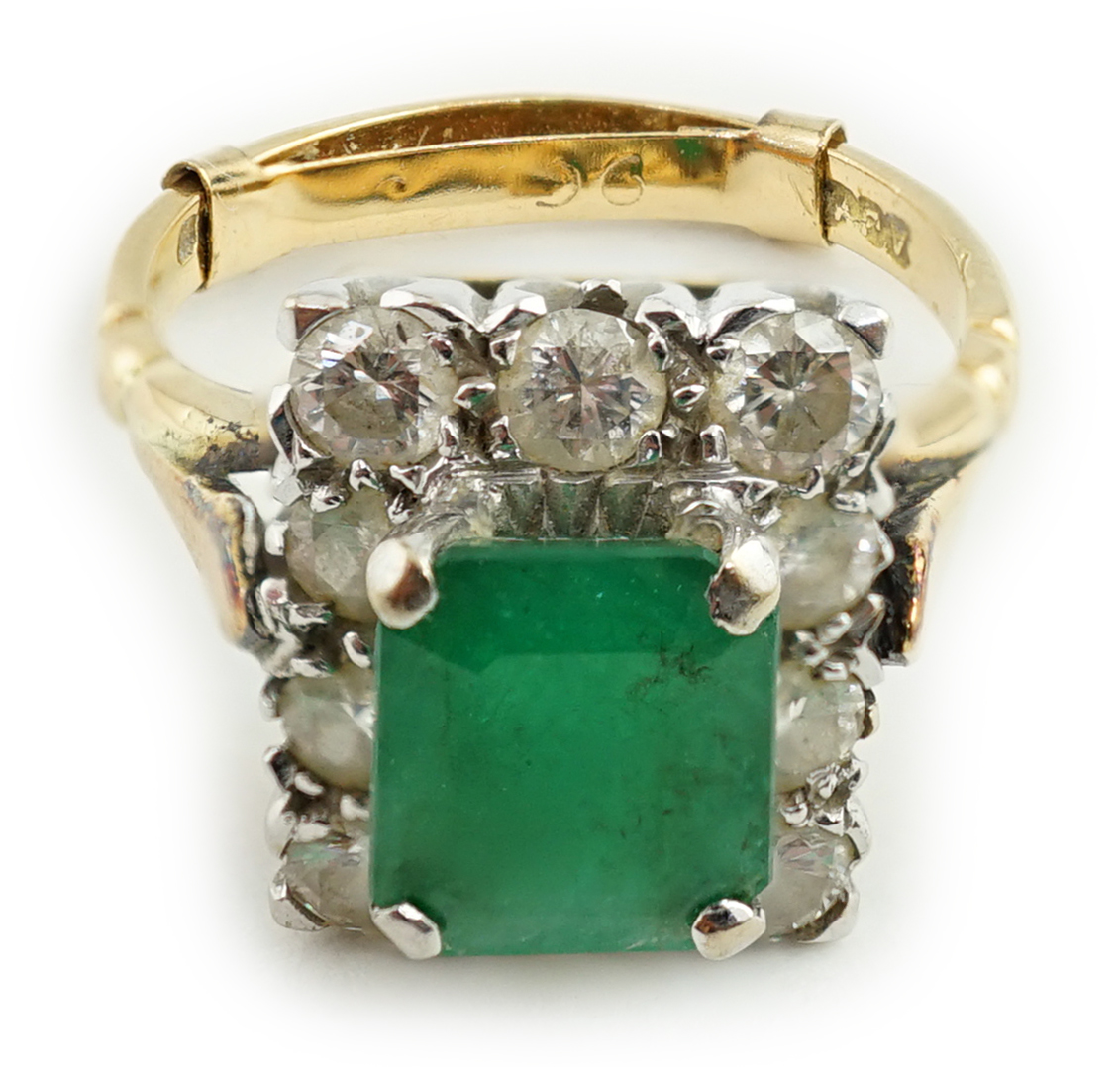 An 18ct gold and platinum, emerald and diamond rectangular cluster ring